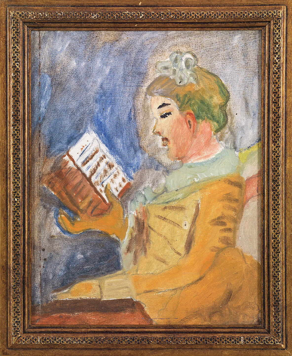 Niña joven leyendo