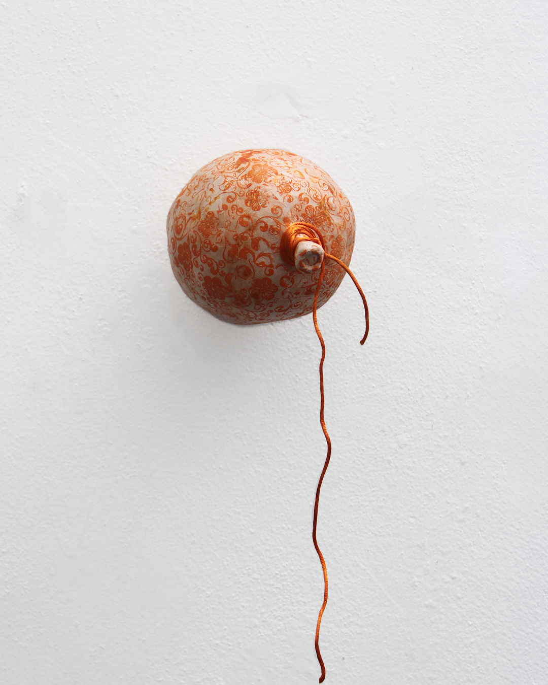 Bomba floreada naranja