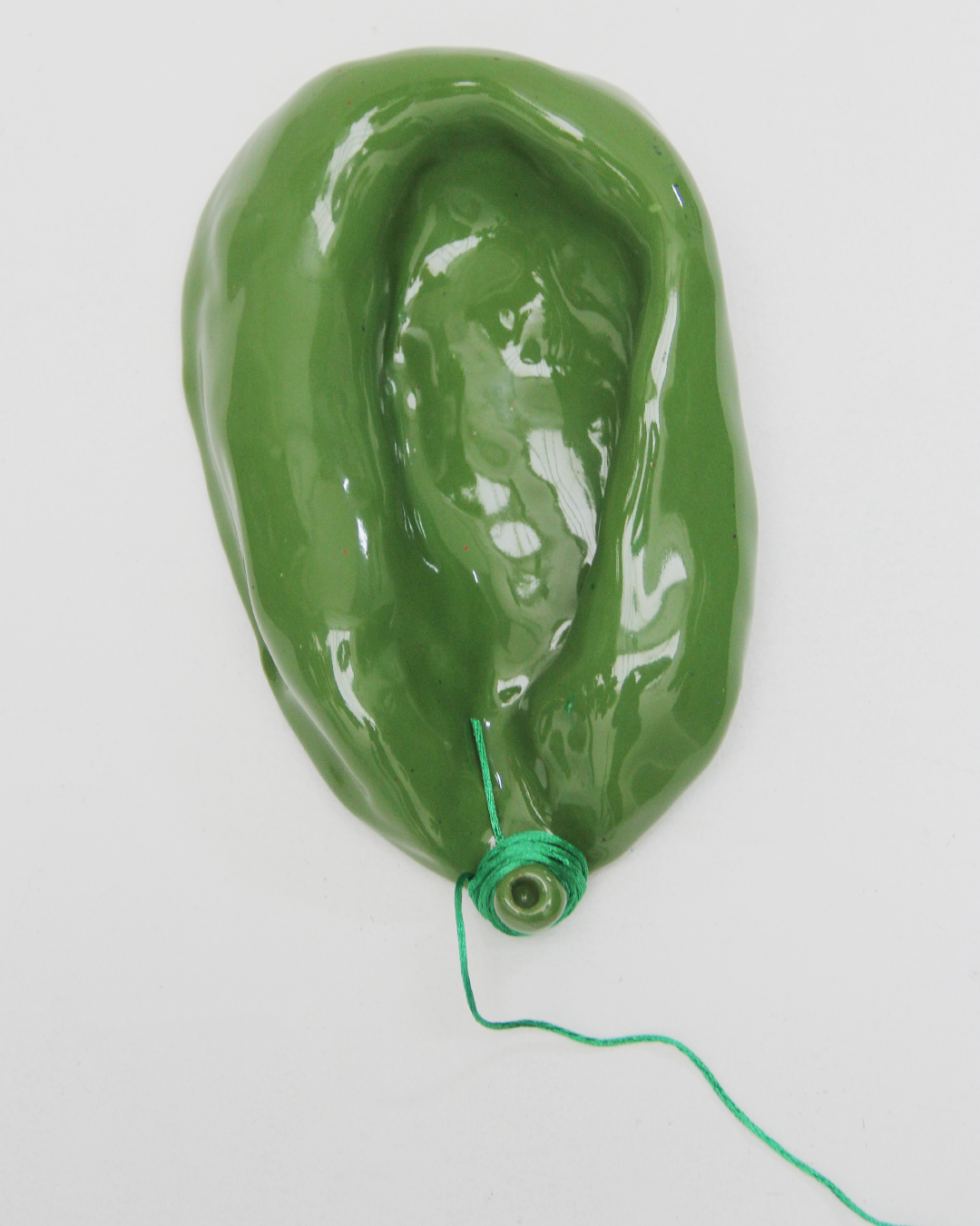 Bomba desinflada verde oliva