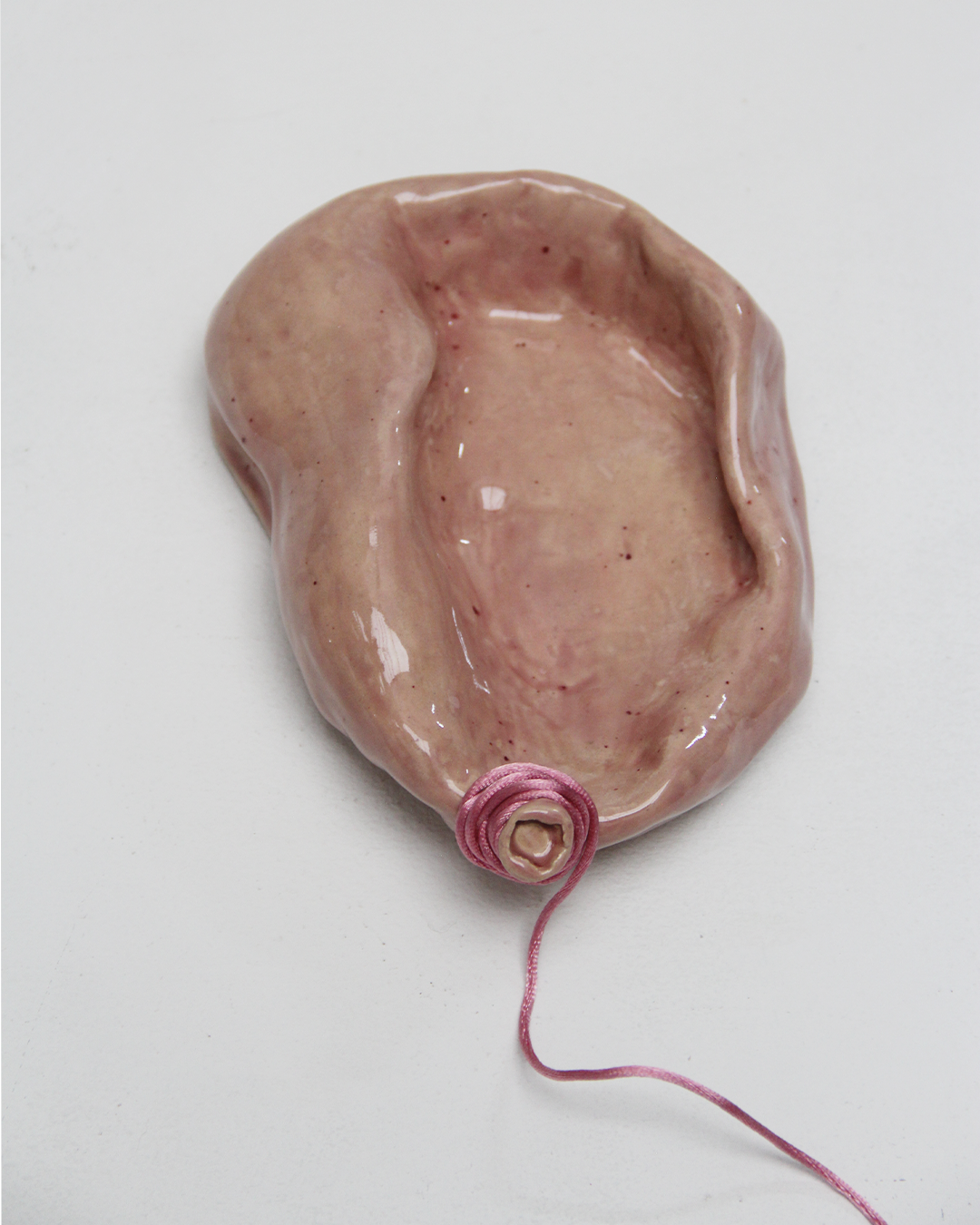 Bomba desinflada rosada 